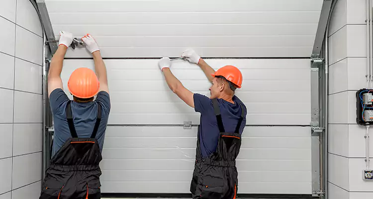 Garage Door Bottom Panel Repair in Town 'n' Country, FL